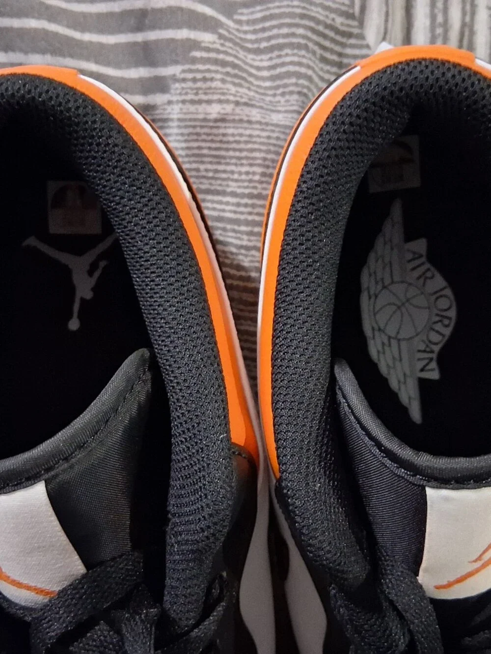 Jordan Shattered Backboards Men’s Low-Top Cleats in Orange, Black & White